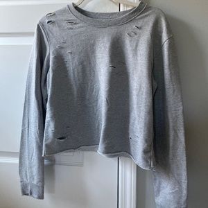 Cropped ripped sweater